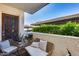 Cozy balcony with stylish seating, providing a relaxing outdoor space and neighborhood views at 11011 N 92Nd St # 1157, Scottsdale, AZ 85260