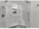 Modern bathroom showcasing a glass-enclosed shower with white subway tile and a gray tiled floor at 11011 N 92Nd St # 1157, Scottsdale, AZ 85260
