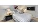 Inviting bedroom with neutral tones, contemporary decor, and comfortable furnishings at 11011 N 92Nd St # 1157, Scottsdale, AZ 85260