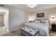 Comfortable bedroom featuring a well-made bed, stylish bench, and neutral tones at 11011 N 92Nd St # 1157, Scottsdale, AZ 85260