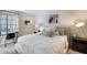 Cozy bedroom with a large bed, stylish decor, and ample natural light at 11011 N 92Nd St # 1157, Scottsdale, AZ 85260