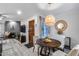 Stylish dining area open to the living room, offering a cozy and inviting atmosphere at 11011 N 92Nd St # 1157, Scottsdale, AZ 85260