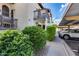 Complex exterior, landscaping and parking showing an assigned, covered parking spot at 11011 N 92Nd St # 1157, Scottsdale, AZ 85260