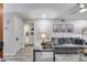 Bright and airy living room featuring a modern sofa, neutral color palette, and stylish decor at 11011 N 92Nd St # 1157, Scottsdale, AZ 85260