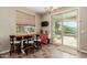 Cozy dining area with sliding glass doors leading to an outdoor patio space at 11023 E Shepperd Ave, Mesa, AZ 85212