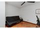 Cozy bedroom with hardwood floors and ceiling fan at 12007 S Crow Ct, Phoenix, AZ 85044