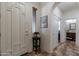 Elegant entryway with decorative tile flooring and arched doorways leading to other areas of the home at 1209 E Park Ave, Chandler, AZ 85225