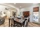 Eat-in kitchen featuring an attractive dining area and view into an adjacent living room at 1209 E Park Ave, Chandler, AZ 85225