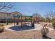 Community playground featuring picnic tables, shaded seating, and play equipment for Gathering fun at 1209 E Park Ave, Chandler, AZ 85225