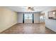 Cozy dining area with tile flooring, modern ceiling fan, and ample natural light at 13114 W Castlebar Dr, Sun City West, AZ 85375