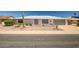 Charming single-story home with desert landscaping, decorative brickwork, and an attached two-car garage at 13114 W Castlebar Dr, Sun City West, AZ 85375