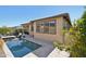 Stunning backyard pool area with a patio, lounge chairs, and lush landscaping, ideal for summer enjoyment at 13418 W Mayberry Trl, Peoria, AZ 85383