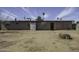 Backyard view of home, including brick and siding exterior at 1518 N Gilbert Ave, Casa Grande, AZ 85122
