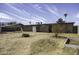 Backyard view of home, including brick and siding exterior at 1518 N Gilbert Ave, Casa Grande, AZ 85122