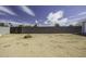 Large, enclosed backyard with plenty of space and a secure block wall, ready for customization and outdoor activities at 1518 N Gilbert Ave, Casa Grande, AZ 85122