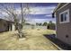 Spacious backyard featuring desert landscaping and a block wall for privacy, creating a blank canvas for outdoor enjoyment at 1518 N Gilbert Ave, Casa Grande, AZ 85122