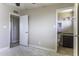 Bedroom with view to bathroom that includes a toilet, sink, and vanity, ready for remodeling at 1518 N Gilbert Ave, Casa Grande, AZ 85122
