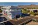 Modern building with unique mural design, visitor parking, and mountain views at 16580 N 92Nd St # 2003, Scottsdale, AZ 85260