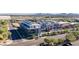 Modern apartment building with well-manicured landscaping and beautiful mountain views in the distance at 16580 N 92Nd St # 2003, Scottsdale, AZ 85260