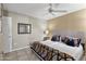 Bedroom featuring two twin beds, neutral paint, and a ceiling fan at 17017 N 12Th St # 1106, Phoenix, AZ 85022