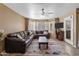 Cozy living room with a large sectional sofa, perfect for relaxing or entertaining at 17017 N 12Th St # 1106, Phoenix, AZ 85022