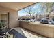 Outdoor patio showcasing a seating area and views of the parking lot and community at 17017 N 12Th St # 1106, Phoenix, AZ 85022