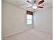 Bedroom with ceiling fan and neutral carpet at 17062 N 184Th Dr, Surprise, AZ 85374
