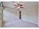 Bedroom with ceiling fan and neutral carpet at 17062 N 184Th Dr, Surprise, AZ 85374
