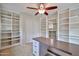 Bonus room has ample storage, built-ins, and a convenient workspace at 17062 N 184Th Dr, Surprise, AZ 85374