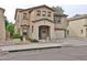 Attractive two-story house with an attached garage, covered entryway, and desert-friendly landscaping at 17062 N 184Th Dr, Surprise, AZ 85374