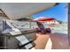 Relaxing backyard with a hot tub, seating area with fire pit, and a view of the inviting pool at 17916 N 183Rd Ave, Surprise, AZ 85374