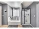 Bathroom showcasing tub, walk-in shower, and neutral gray walls at 17916 N 183Rd Ave, Surprise, AZ 85374