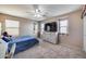 Bedroom boasts ample natural light, large closet, and a ceiling fan at 17916 N 183Rd Ave, Surprise, AZ 85374