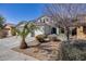 Well-manicured front yard with mature landscaping and a welcoming entrance at 17916 N 183Rd Ave, Surprise, AZ 85374