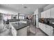 Open kitchen flowing into the living area, with an island and modern finishes at 17916 N 183Rd Ave, Surprise, AZ 85374