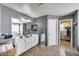 Bathroom offers double sinks, vanity, and access to walk-in closet at 17916 N 183Rd Ave, Surprise, AZ 85374
