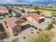 Aerial view of a charming community featuring well-maintained homes and desert landscaping at 188 N Nueva Ln, Casa Grande, AZ 85194