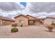 This view of the back yard shows the low maintenance landscaping at 188 N Nueva Ln, Casa Grande, AZ 85194