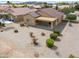 Aerial view of backyard featuring a covered patio and easy-care desert landscaping at 188 N Nueva Ln, Casa Grande, AZ 85194