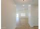 Open foyer with tile flooring leading to the living area, showcasing the home's spacious layout at 188 N Nueva Ln, Casa Grande, AZ 85194