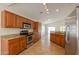 Well-equipped kitchen boasts granite countertops, stainless steel appliances, and ample cabinet space at 188 N Nueva Ln, Casa Grande, AZ 85194