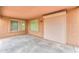 Covered patio, featuring a roll down sun shade for added comfort and privacy at 188 N Nueva Ln, Casa Grande, AZ 85194