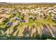 Aerial shot featuring the community park and lush landscaping at 19277 N 78Th Ln, Glendale, AZ 85308