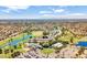 Wide aerial view of the community showcasing the golf course, lakes, and recreational facilities at 19277 N 78Th Ln, Glendale, AZ 85308