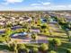 Community park featuring a playground, basketball court, and picnic area with mature trees at 19277 N 78Th Ln, Glendale, AZ 85308