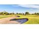 Scenic view of the lush golf course with manicured greens and sand trap at 19277 N 78Th Ln, Glendale, AZ 85308