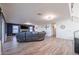 Cozy living room features a fireplace, modern flooring, and an open layout for Gathering gatherings at 19277 N 78Th Ln, Glendale, AZ 85308