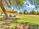 Shaded picnic area in the park featuring picnic tables and barbecue grills at 19277 N 78Th Ln, Glendale, AZ 85308