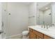 Functional bathroom featuring a glass shower enclosure, toilet and vanity at 20802 N Grayhawk Dr # 1151, Scottsdale, AZ 85255