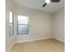 Cozy bedroom featuring large windows and neutral walls at 20802 N Grayhawk Dr # 1151, Scottsdale, AZ 85255
